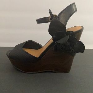 black wedges with flower detail